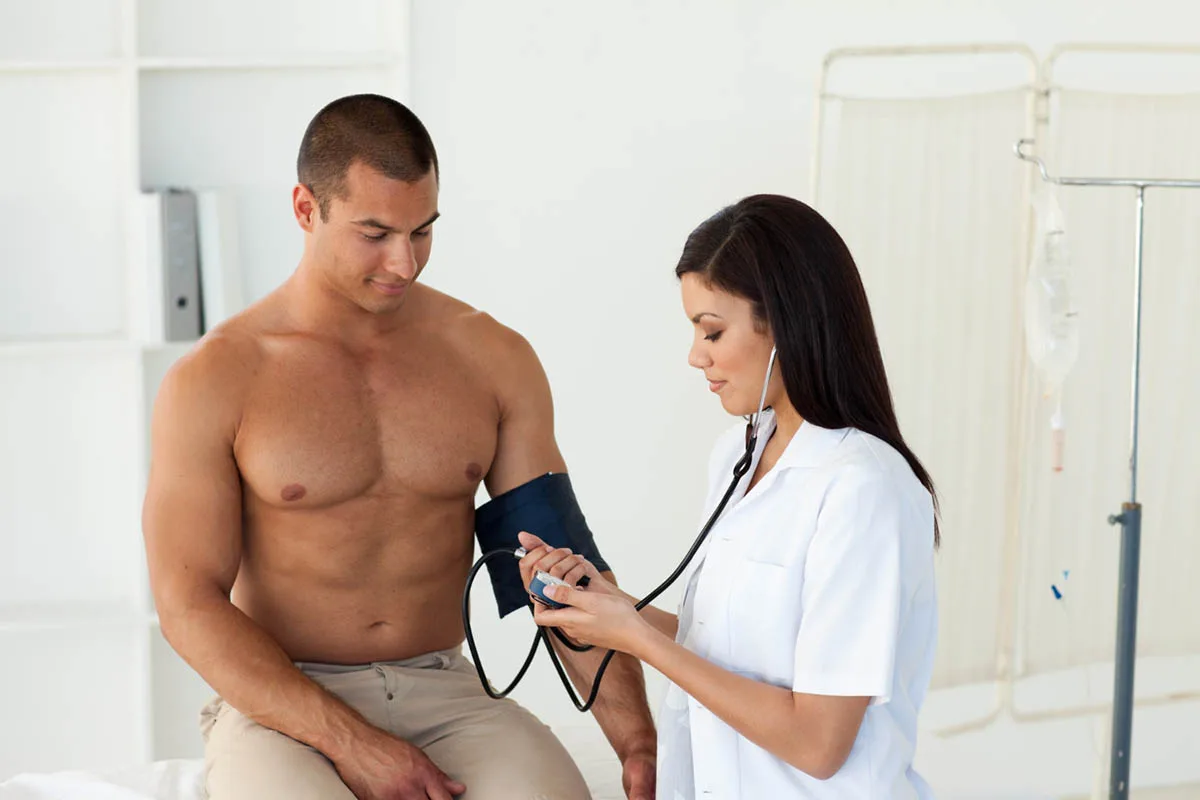 Doctor reviewing blood work results with patient
